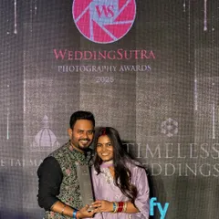 A photo of our founders holding our WeddingSutra Photography Award. We are incredibly grateful for this honor and for every couple who has allowed us to be a part of their journey.