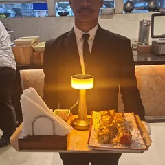Every detail matters. My staff serves appetizers on well-organized trays, complete with napkins and sauces, ensuring a polished and convenient service for your guests.