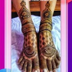 A classic foot mehandi design with symmetrical patterns on both feet. This style uses circular motifs and detailed line work, perfect for any traditional occasion.