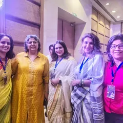Networking with fellow panelists and attendees at the "Boss Lady Spotlight" event. These connections with other women leaders are vital for building a strong support ecosystem.