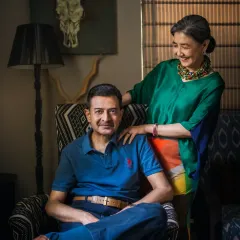 A portrait of a couple in their own home, surrounded by their personal style. It’s a wonderful way to capture not just their relationship, but also the life they've built together.