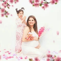 A joyful family maternity session celebrating the upcoming arrival with an older sibling. These moments are so special, capturing the excitement of the whole family in a fun, lighthearted setting.