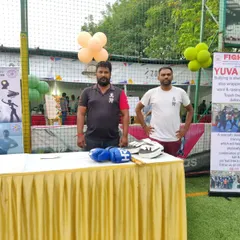 My team and I at our Fighting Fit stall. We enjoy getting out in the community to spread awareness about practical self-defense and fitness.