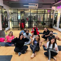 A happy, sweaty group after a challenging but rewarding yoga session. The collective energy makes every class special.