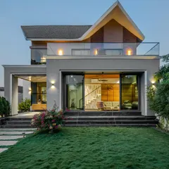 Our "Tranquil Mango Haven" project embodies our approach to private estates. The architecture and landscape are designed as one, with the home opening directly onto manicured lawns and natural greenery, creating a seamless transition between indoor and outdoor living.