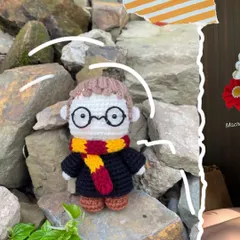For the Potterheads, we have this adorable mini Harry Potter Amigurumi. Complete with his glasses and Gryffindor scarf, he's ready for a magical adventure.