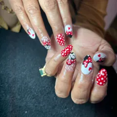 A playful and nostalgic Minnie Mouse themed set. This design features classic red and white polka dots, Minnie's silhouette, and cute bow details, perfect for a fun and cheerful look.