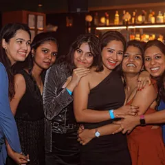 A candid shot of a group of friends having an amazing time on the dance floor. This is the energy I love to see.