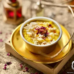 My Pineapple Soufflé is light, airy, and melts in your mouth. This delicate dessert is topped with almond flakes and dried rose petals for a touch of elegance.
