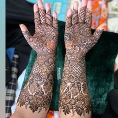 The completed look for the floral and geometric design, showing the symmetrical pattern on both arms.
