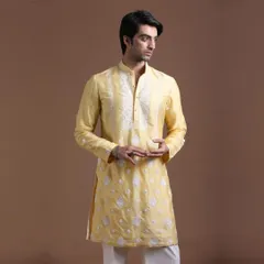 The perfect Haldi outfit should be vibrant and stylish. This yellow embroidered kurta brings together tradition and modern flair, allowing you to step into your celebration with comfort and grace.