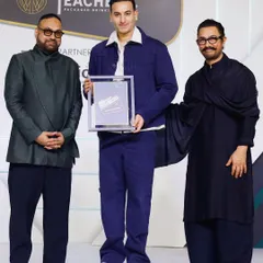 Receiving the GQ 'Most Influential Young Indians' award alongside Aamir Khan. This recognition from a major publication highlights my influence in bringing traditional music to the forefront of modern culture.