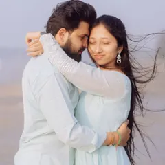 A quiet, windswept moment during a pre-wedding shoot on the beach. I focus on creating a comfortable space where couples can be themselves, resulting in genuine and emotional portraits like this.