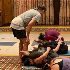 Our Guru, Sharath Jois, giving adjustments during a workshop. His deep knowledge and precise guidance are a cornerstone of the Ashtanga tradition, which we strive to uphold in our shala.