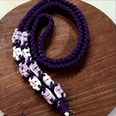 A designer lanyard in purple, white, and lilac with a floral pattern. I love creating these unique color combinations!