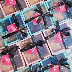 These assorted brownie boxes were made as return favors for a baby shower. The pink and blue boxes with the "Baby on Board" tags were such a cute touch.