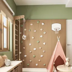 This close-up highlights the active play zone in the kids' room, featuring a miniature climbing wall, gymnastics rings, and a basketball hoop. Our visualizations ensure that even the most playful elements are integrated safely and stylishly into the room's design.