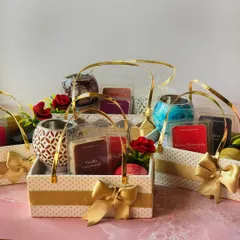 A full view of the custom gift baskets, each containing a wax warmer, wax melts, and a jar candle. These handmade soy candle hampers are a thoughtful way to show appreciation for employees, clients, or event attendees.
