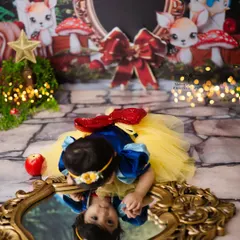 A beautiful overhead shot of Snow White and her reflection. I love using creative angles to add an artistic touch to my fairytale photoshoots.