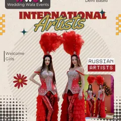 For that 'hatke' factor, we bring in international artists like these Russian performers in vibrant, feathered costumes to welcome your guests.