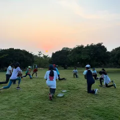 Young adventurers participate in a morning fitness session at sunrise. We start each day with energizing activities to prepare them for the challenges and fun ahead.