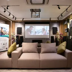 One of our comfortable demo rooms, designed to replicate a real living room environment. Here you can experience how high-performance audio and video integrate into a stylish living space.