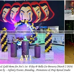 A chic black and gold theme for a first birthday at Bella Ciao Brewery, inspired by the venue's name. The decor features a "Money Heist" themed backdrop, black and gold balloon pillars, and themed cylinder tables for a unique and stylish party.