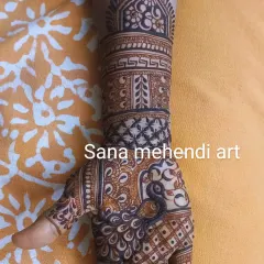 A single hand design featuring a peacock on the palm, with intricate geometric patterns on the wrist.