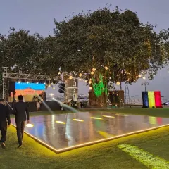The calm before the party. Setting up the dance floor and stage for the Belgian King's Day celebration. We work alongside the best event planners to ensure every detail, from the food service to the event flow, is perfectly synchronized.