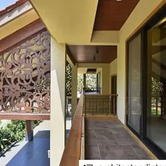An ornate laser-cut metal screen provides privacy and a beautiful design element to the balcony of this Khandala home. This detail shows our commitment to adding artistic and functional touches to our architectural work.