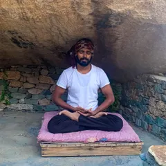 In the quiet of this rock cave, I find a deep sense of grounding. My personal sadhana is the foundation of everything I teach.