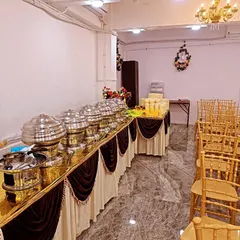 Our all-inclusive packages include catering. This is a view of the buffet setup with chafing dishes, ready to serve delicious food to your guests in our Kalyan hall.