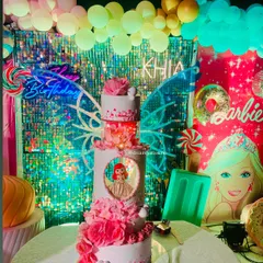 Another angle of the grand 5-tier birthday cake, highlighting the intricate details and impressive height. This was a proud moment for me as a creator, bringing a client's simple request for "classy" to life in a big way.