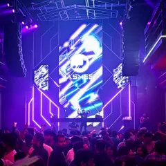 A look at a packed-out club night. Whether it's a wedding after-party or a public gig, my goal is always the same: keep the floor full and the energy high with a seamless mix of tracks.