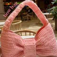 Another look at the Bow Bag. The handle is braided for extra strength and the bow shape holds up really well, even when you fill the bag.