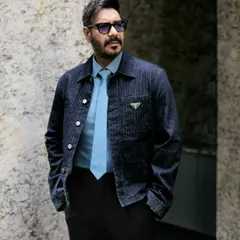 This look for Ajay Devgn at the 'Son of Sardaar 2' trailer launch features a structured Prada denim jacket and a sharp tie, creating a modern and sophisticated statement in menswear.