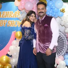 A lovely portrait of the expecting couple at their baby shower. I make sure to capture the couple together against the beautiful decor, documenting this special milestone.