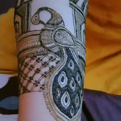 A close-up of the peacock motif from the previous design. I take great care in detailing the feathers and posture to make it a true centerpiece of the mehendi.