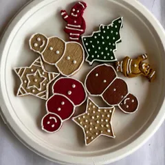 A delightful assortment of our handmade Christmas cookies. Featuring snowmen, stars, and Christmas trees, these are perfect for a festive snack or gift.