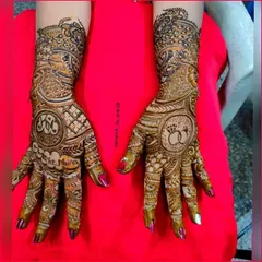 Your mehendi should tell your love story. Here, I incorporated the couple's initials and their engagement rings into the design, making it a truly personal piece of art for their special day.