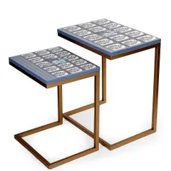 My "Ek Aur Totta" C-stack tables are designed for modern living. They are functional and artistic, featuring a playful parrot motif inspired by a funny moment in my studio. These nesting tables can be used together or separately, bringing a touch of elegance and personality to any corner.
