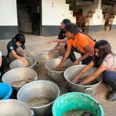 Teamwork makes the dream work, especially when it's time for dinner. Campers learn how to prepare feed, measuring and mixing the specific nutritional components each horse needs to stay healthy and strong.