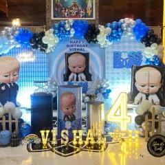 A "Boss Baby" theme is a huge hit for kids' birthdays. I designed this complete setup with life-sized character cutouts, a custom backdrop, themed plinths for the cake, and marquee lighting to make the birthday boy feel like a real boss.