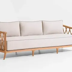 This elegant three-seater sofa features a clean wooden frame with intricate lattice details on the arms, showcasing a blend of contemporary design and classic craftsmanship. It's an ideal centerpiece for a living room or a premium outdoor lounge area.