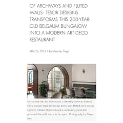 Another look at the Elle Decor feature, which delves into the design details like the custom-made jali screen in the entryway and the British-style sconce lights that add drama to the space.
