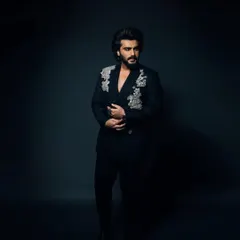 A darker, more dramatic shot of Arjun Kapoor's custom Anamika Khanna suit. The craftsmanship is truly a work of art.