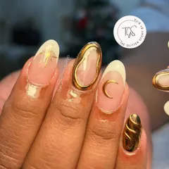 A celestial-themed set featuring 3D gold chrome outlines, a crescent moon, and a star charm. This design creates a unique, liquid-metal effect on the nails.