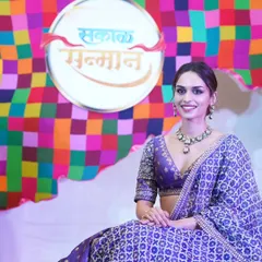 A posed photograph of actress Manushi Chhillar at the Sakal Sanman Awards. I provide professional red carpet and backdrop photography to highlight your event's branding and special guests.