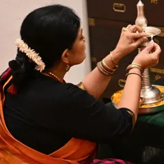 We begin every significant event with a prayer. Here, I am lighting the lamp to commence the Gejjai Puja, a ceremony to bless the ghungroos and the dancer before her final arangetram rehearsal.