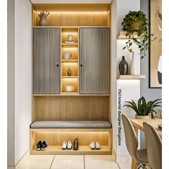 A beautifully organized entryway unit with a cushioned bench, open shoe storage at the bottom, and fluted cabinet doors. The integrated lighting in the open niches adds warmth and highlights decorative items.